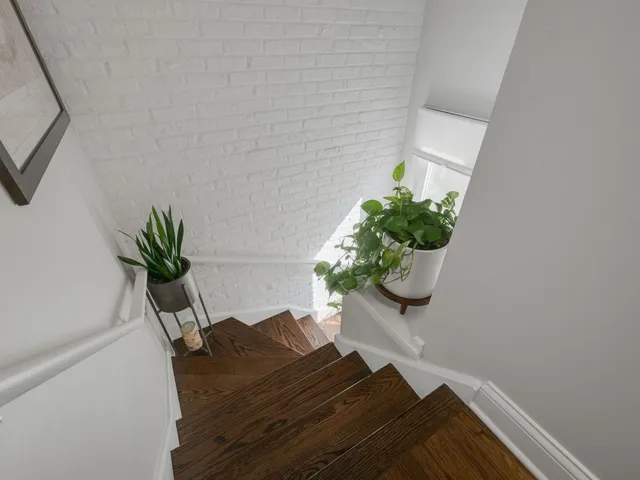 a vase of flowers sitting on a table