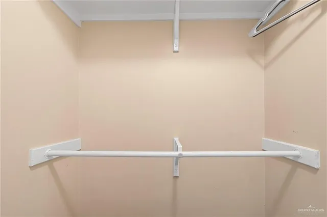 a view of a room with racks on the wall