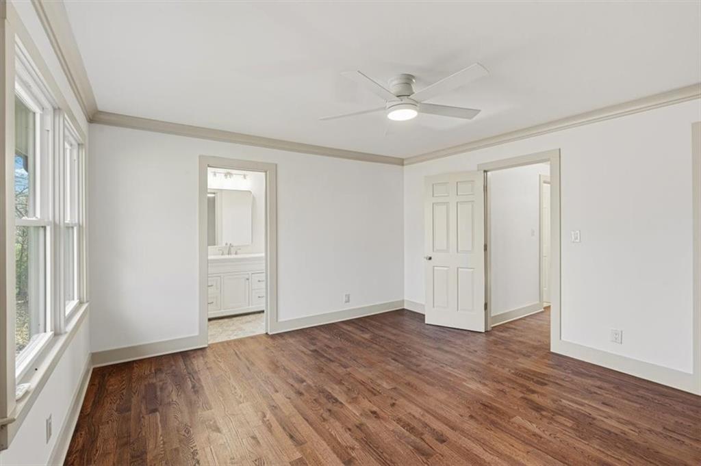 49 Apache Trail Cartersville, GA 30120 - Photo 32 of 52 a view of an empty room with wooden floor and a window