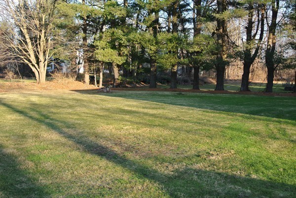 220 7 Bridge Road Lancaster, MA 01523 - Photo 5 of 21 a view of a house with a yard