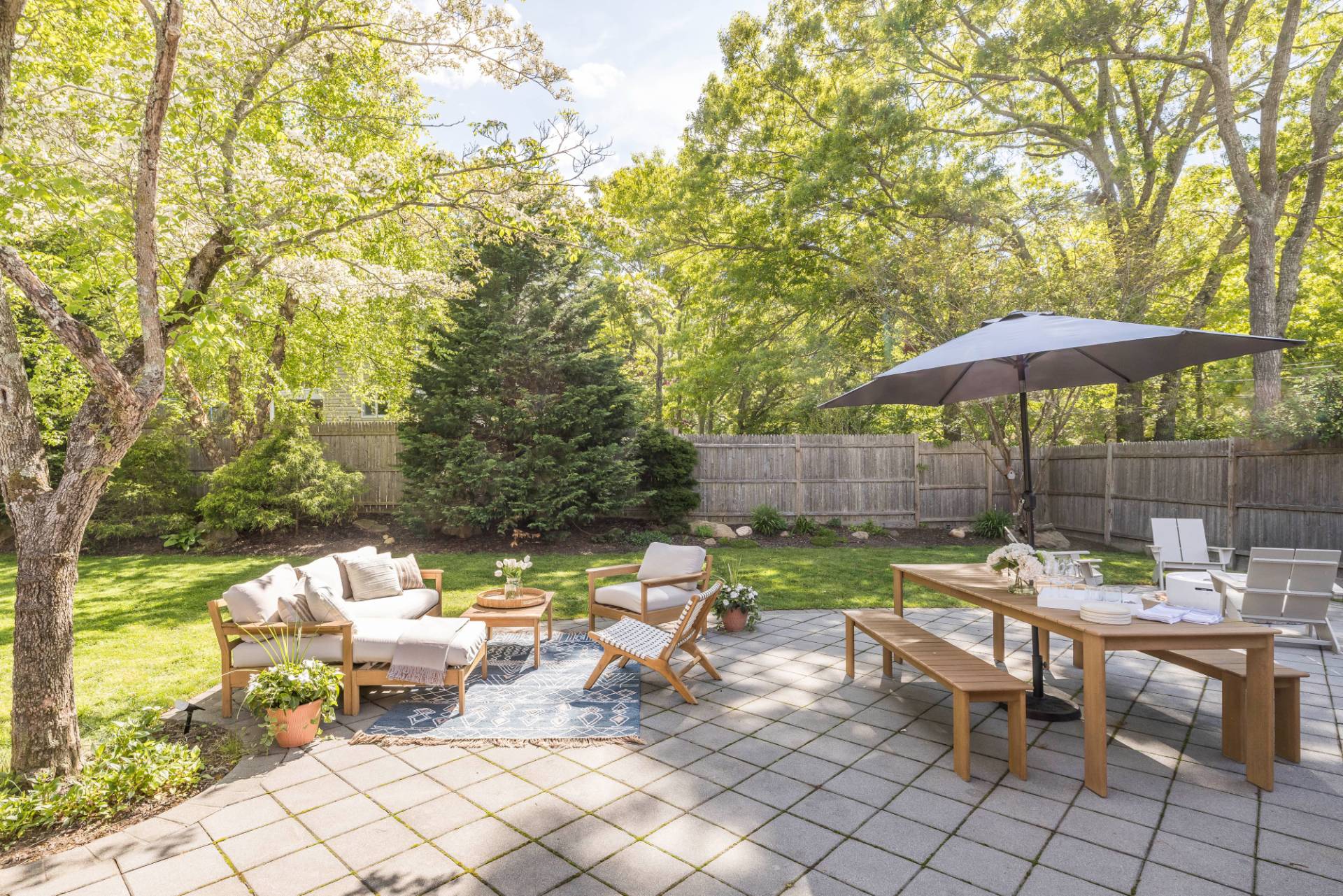 40 Ridge Road West Sag Harbor, NY 11963 - Photo 21 of 27 a view of a patio with furniture and a fire pit