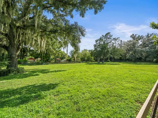 a view of a golf course with a lake