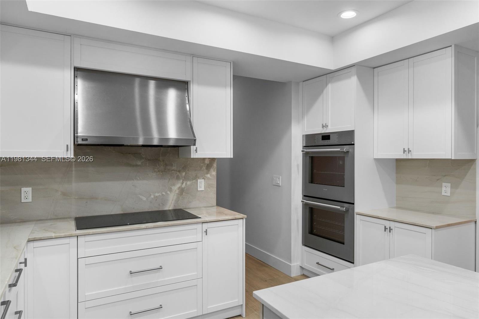 6320 Hancock Road Southwest Ranches, FL 33330 - Photo 22 of 58 a kitchen with a sink and a refrigerator