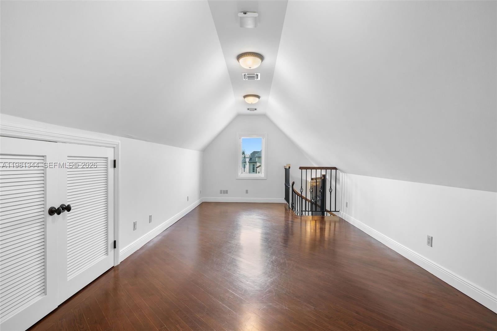 6320 Hancock Road Southwest Ranches, FL 33330 - Photo 33 of 58 wooden floor in an empty room with a window