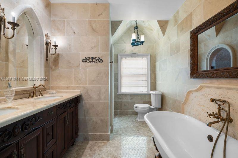 6320 Hancock Road Southwest Ranches, FL 33330 - Photo 37 of 58 a bathroom with a sink and a mirror