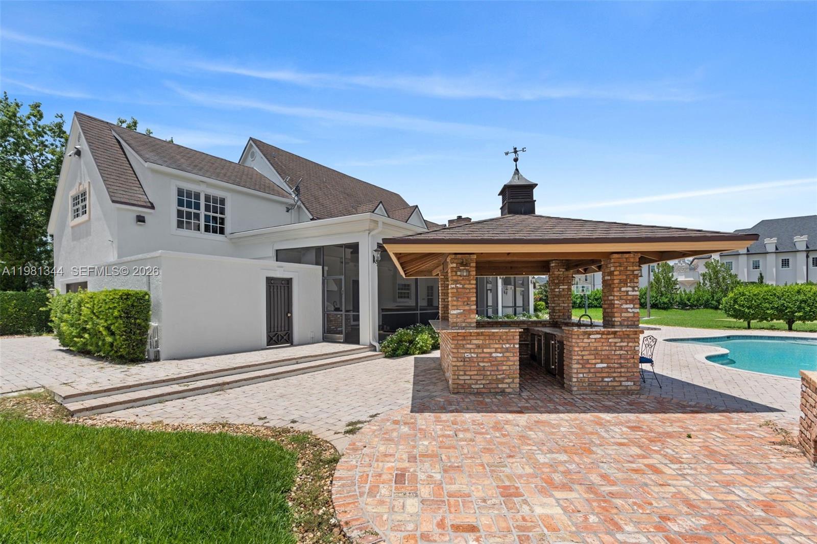 6320 Hancock Road Southwest Ranches, FL 33330 - Photo 50 of 58 a front view of a house with garden