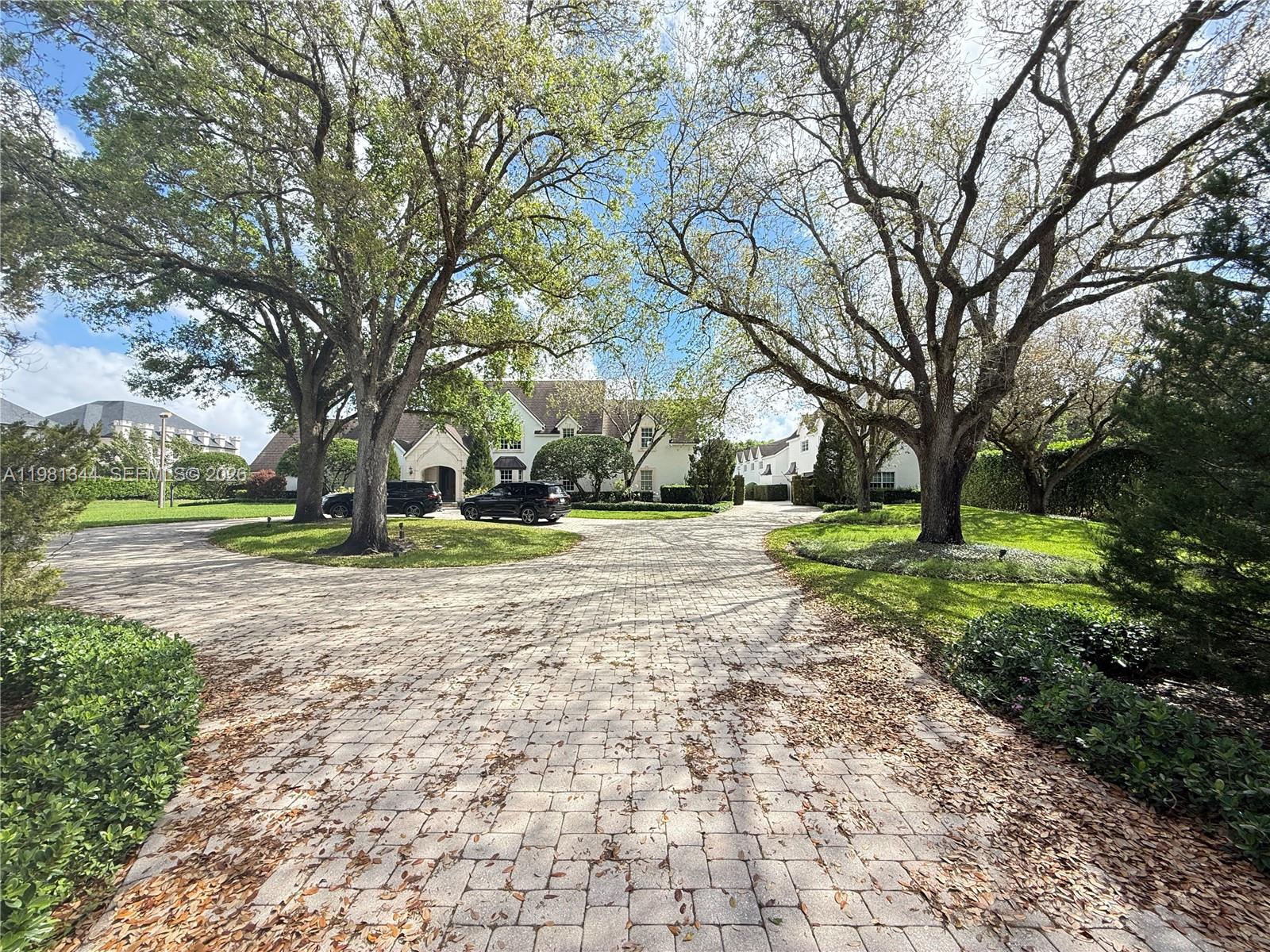6320 Hancock Road Southwest Ranches, FL 33330 - Photo 5 of 58 a view of a yard with plants and large trees