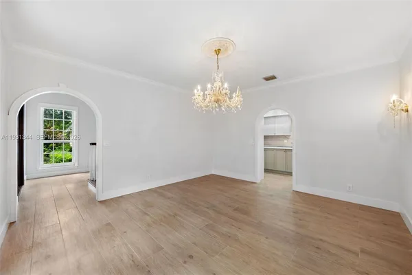 a view of livingroom with hardwood floor and fireplace