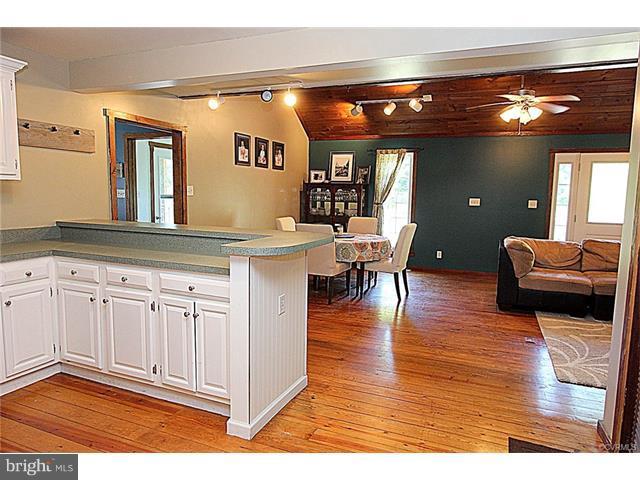 18248 Teman Road Beaverdam, VA 23015 - Photo 4 of 22 Kitchen into Dining Area and Living Room