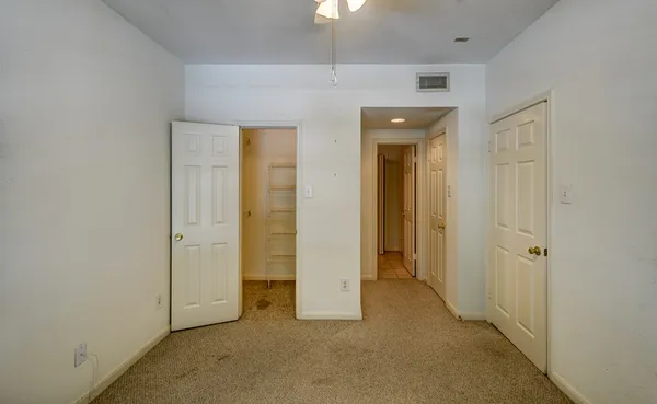 wooden floor and closet in a room