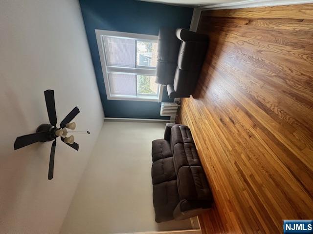 215 Orient Way, Unit B2 Rutherford, NJ 07070 - Photo 11 of 29 a living room with furniture and a window