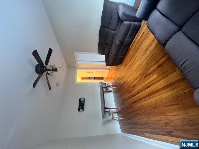 215 Orient Way, Unit B2 Rutherford, NJ 07070 - Photo 12 of 29 a living room with furniture and a wooden floor