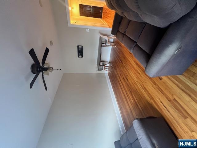 215 Orient Way, Unit B2 Rutherford, NJ 07070 - Photo 13 of 29 a living room with furniture and a wooden floor