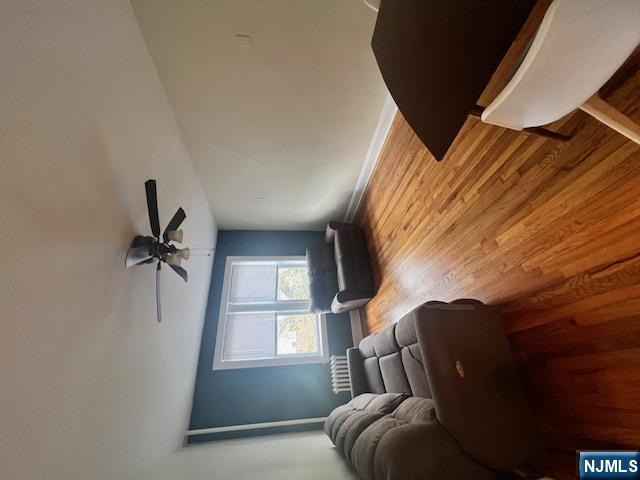 215 Orient Way, Unit B2 Rutherford, NJ 07070 - Photo 14 of 29 a living room with furniture and a lamp