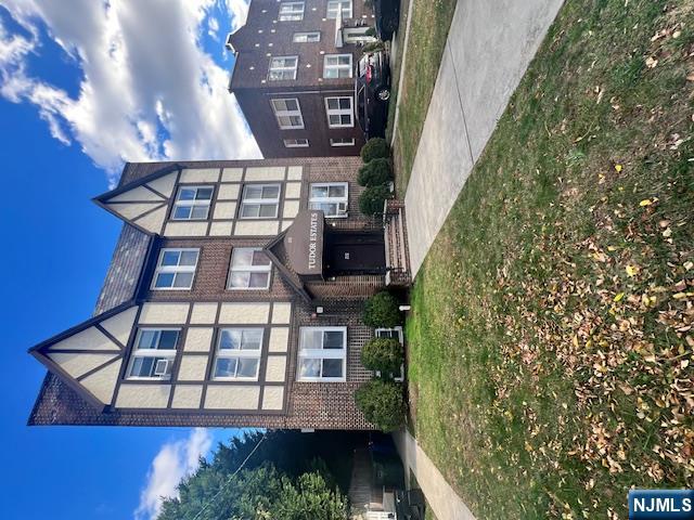 215 Orient Way, Unit B2 Rutherford, NJ 07070 - Photo 2 of 29 a front view of a building with a garden
