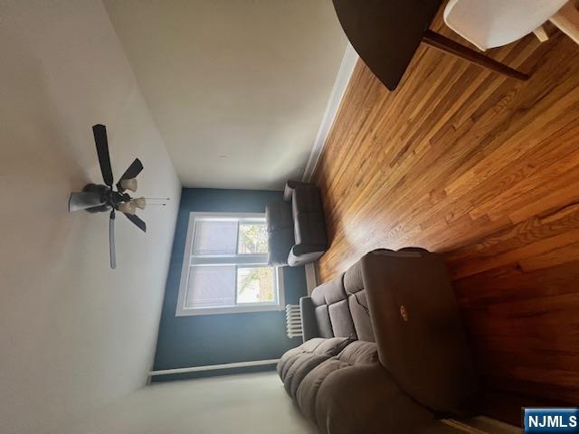 215 Orient Way, Unit B2 Rutherford, NJ 07070 - Photo 4 of 29 a living room with furniture and a large window