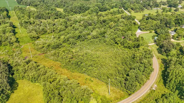 a view of swimming pool from a balcony