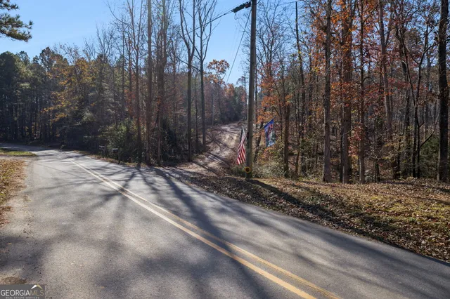 a view of a backyard of the house