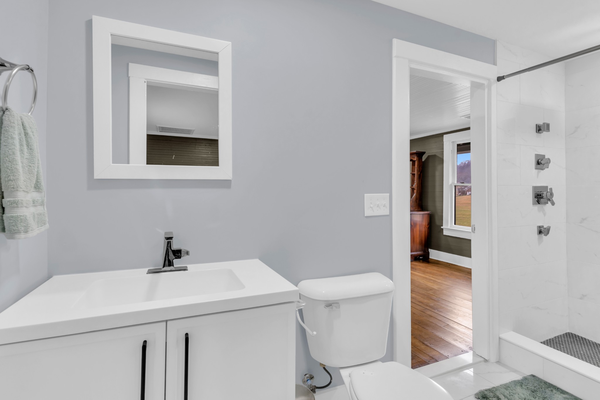 3039 Pigg Hollow Road Petersburg, TN 37144 - Photo 16 of 38 a bathroom with a sink a toilet and shower