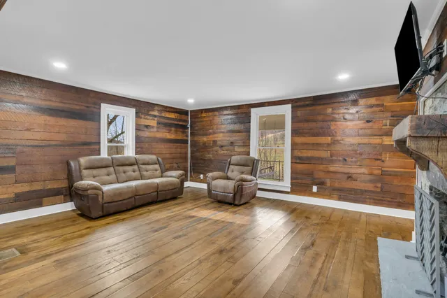 a kitchen with stainless steel appliances granite countertop a sink and cabinets