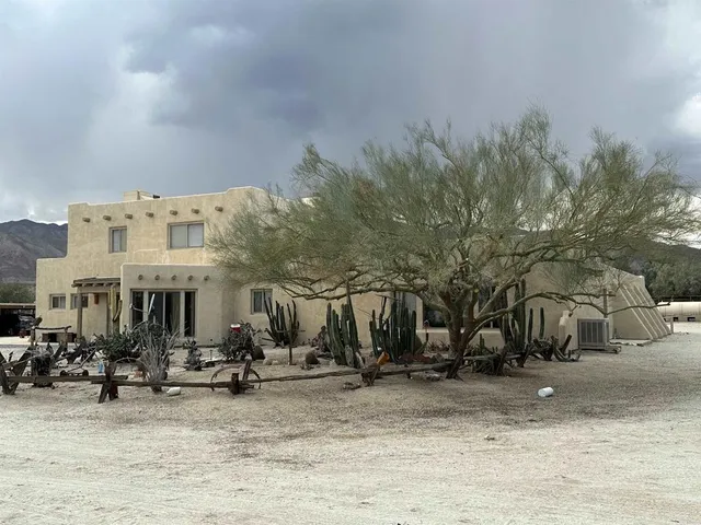 a view of a town with cars park