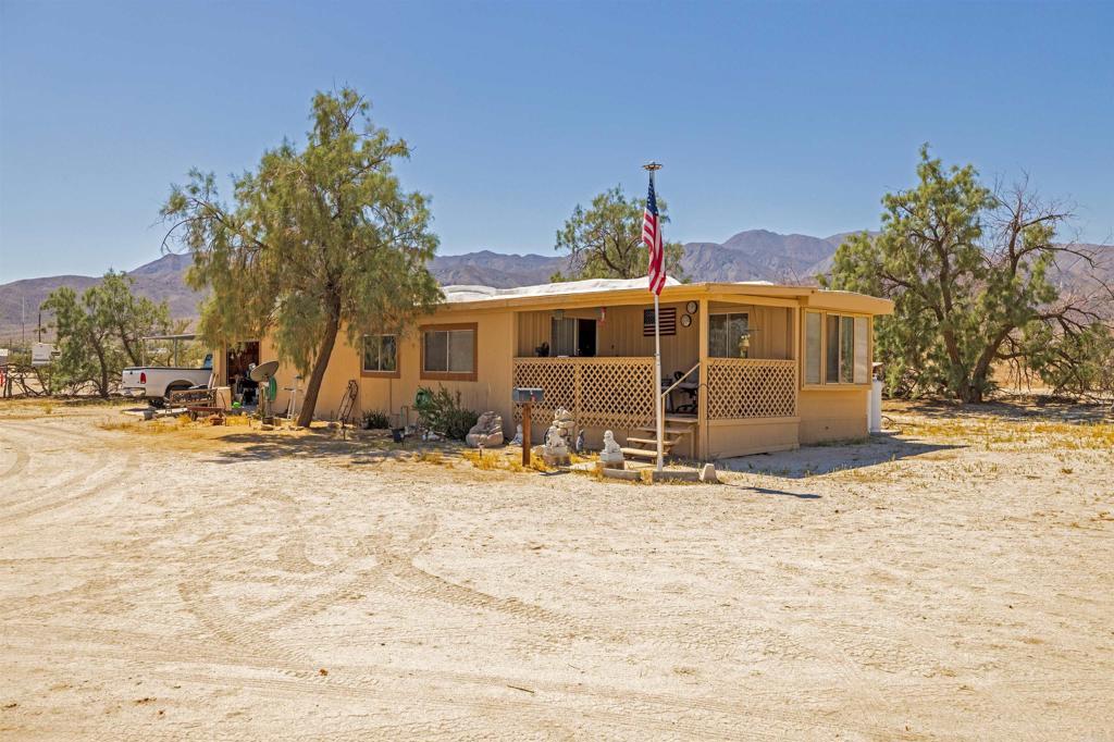 6226 Split Mountain Road Borrego Springs, CA 92004 - Photo 40 of 57 a view of a house with snow on the road