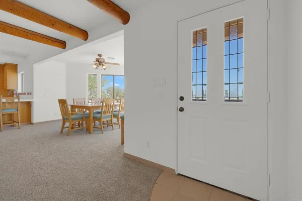 a white toilet sitting next to a bathroom sink