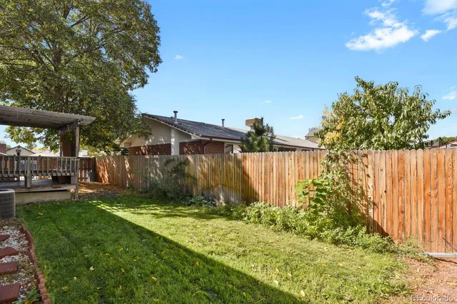 a view of a backyard with a garden