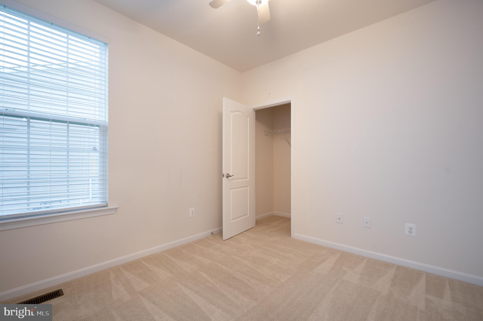 173 Silver Maple Road Middletown, DE 19709 - Photo 24 of 36 an empty room with windows