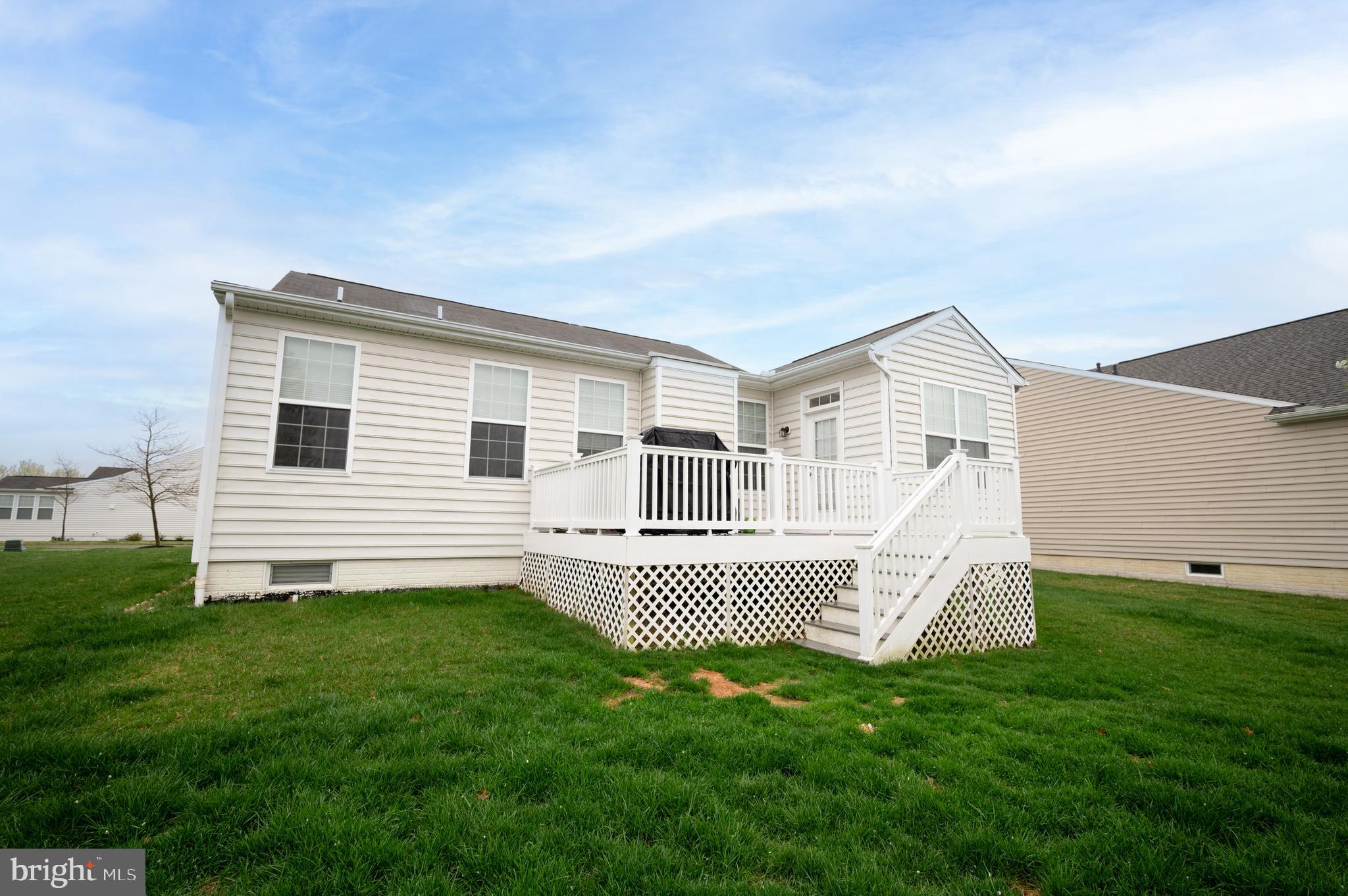 173 Silver Maple Road Middletown, DE 19709 - Photo 35 of 36 a front view of a house with a yard
