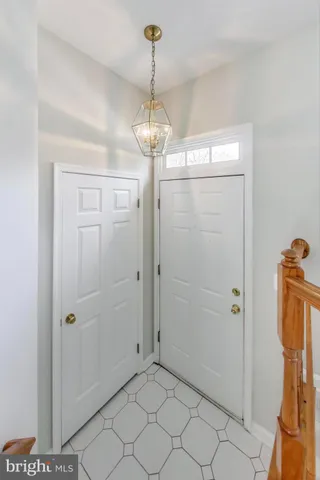 a view of a chandelier in bathroom