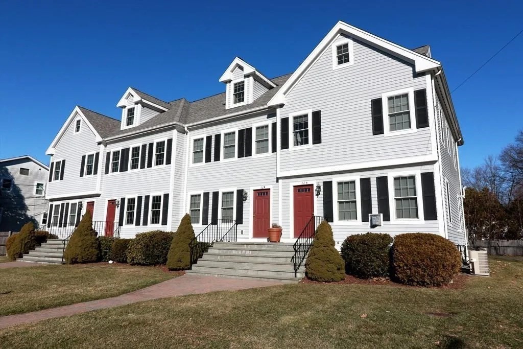 132 Howe Street, Unit B Natick, MA 01760 - Photo 1 of 32 a front view of a house with a yard