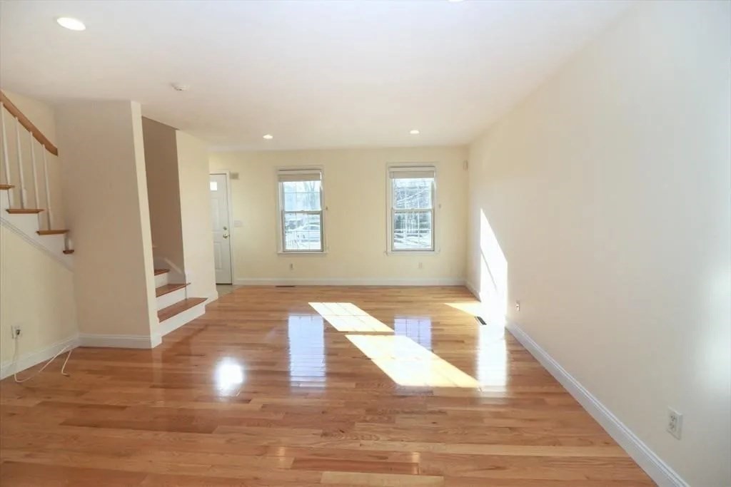 132 Howe Street, Unit B Natick, MA 01760 - Photo 30 of 32 a view of entryway with wooden floor