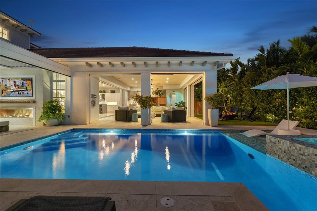 936 Surfsedge Way Vero Beach, FL 32963 - Photo 5 of 36 a view of swimming pool with outdoor seating
