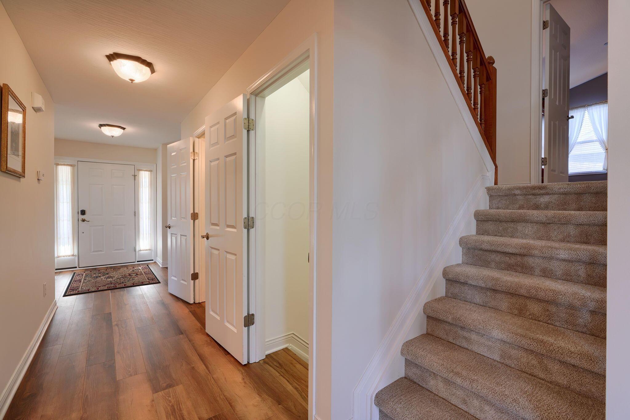 7732 Maple Run Lane Powell, OH 43065 - Photo 23 of 59 Hallway & staircase
