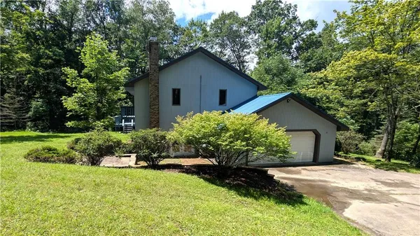 a house view with a garden space