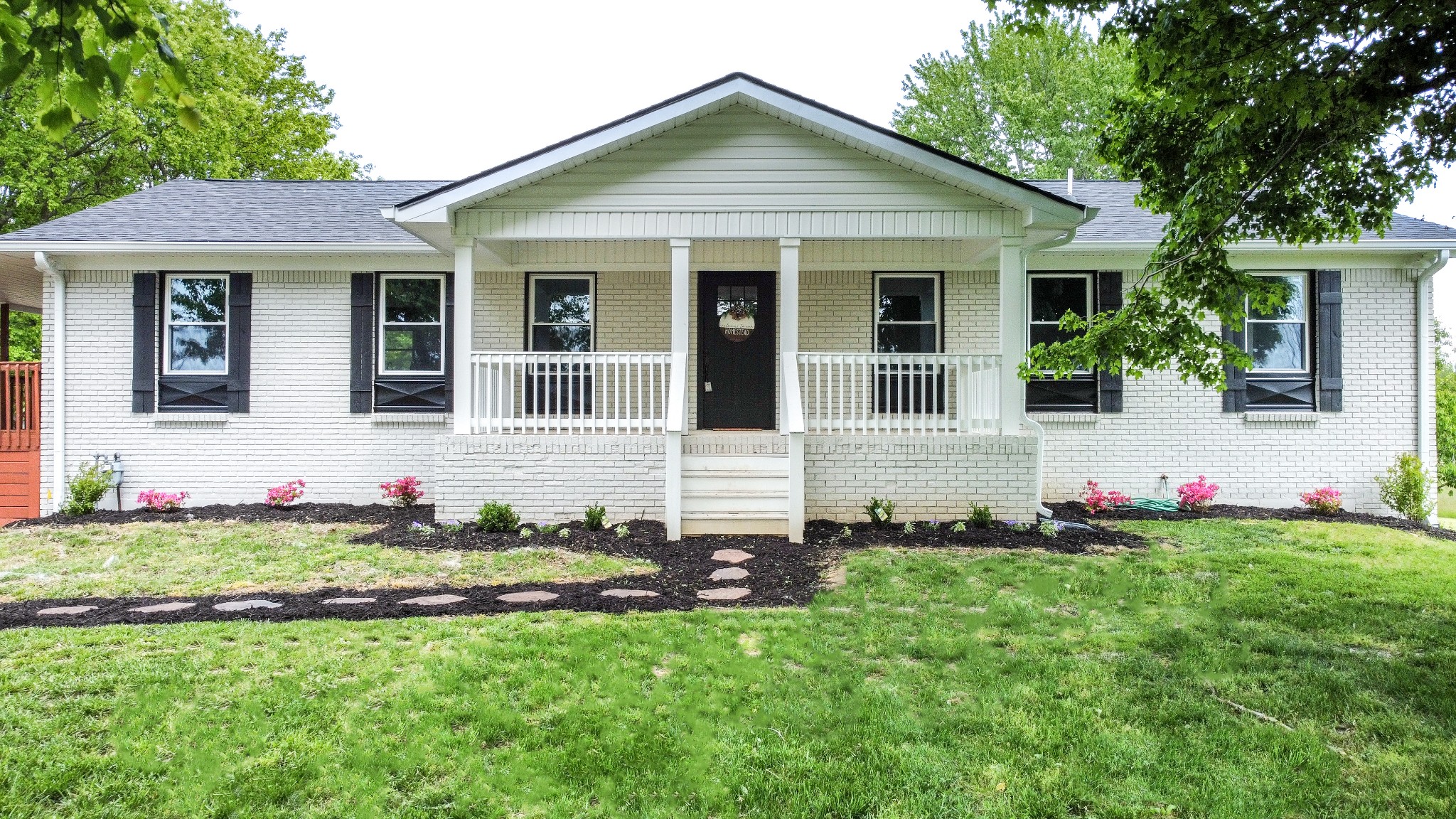 113 Old Parkers Chapel Road Portland, TN 37148 - Photo 1 of 27 front view of a house with a yard