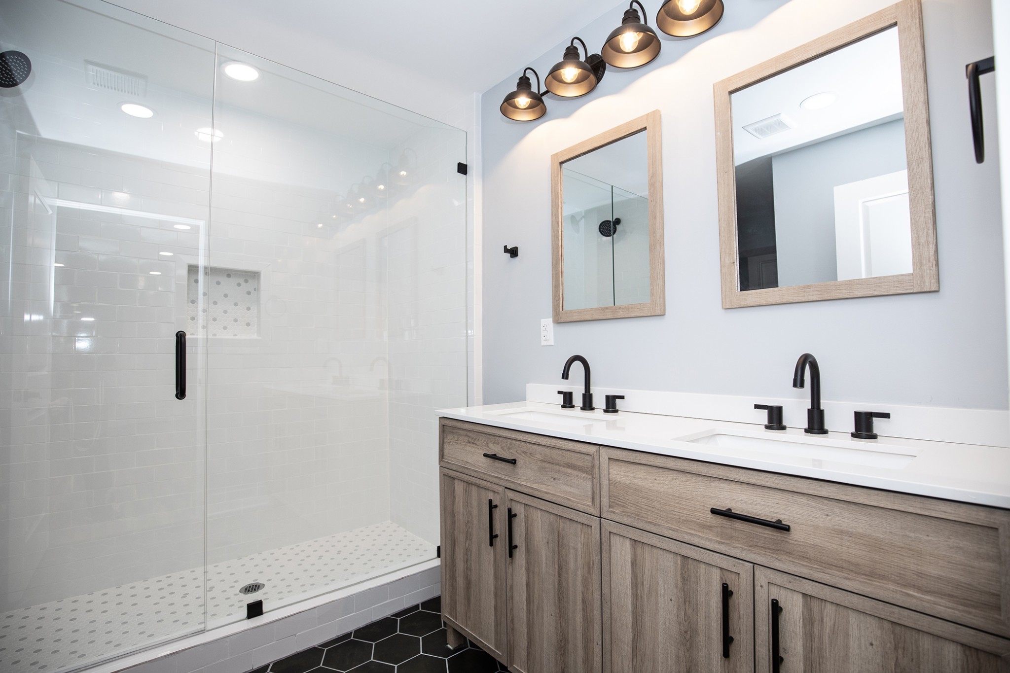 113 Old Parkers Chapel Road Portland, TN 37148 - Photo 21 of 27 a bathroom with a double vanity sink mirror and shower