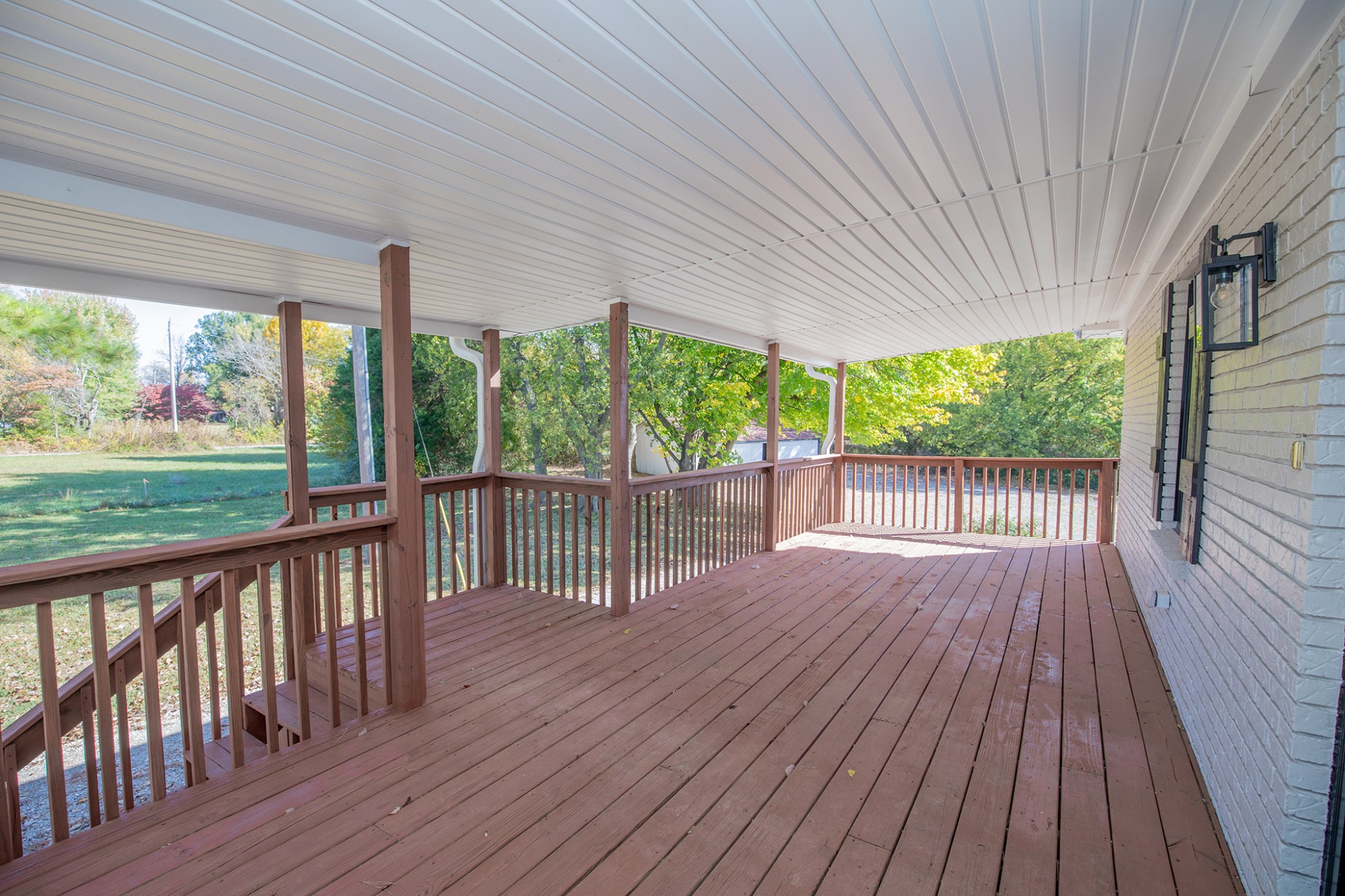 113 Old Parkers Chapel Road Portland, TN 37148 - Photo 22 of 27 a view of a wooden deck with a yard