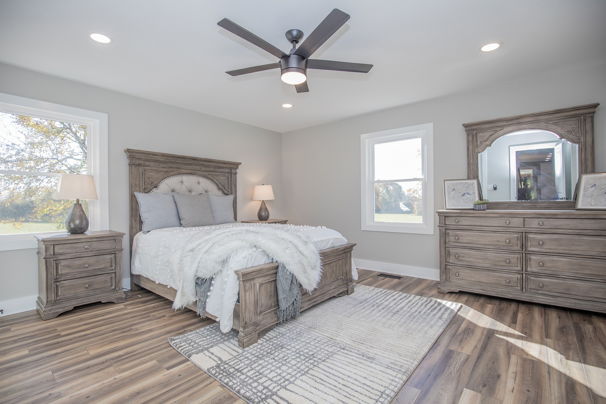 113 Old Parkers Chapel Road Portland, TN 37148 - Photo 9 of 27 a bedroom with a large bed and a dresser