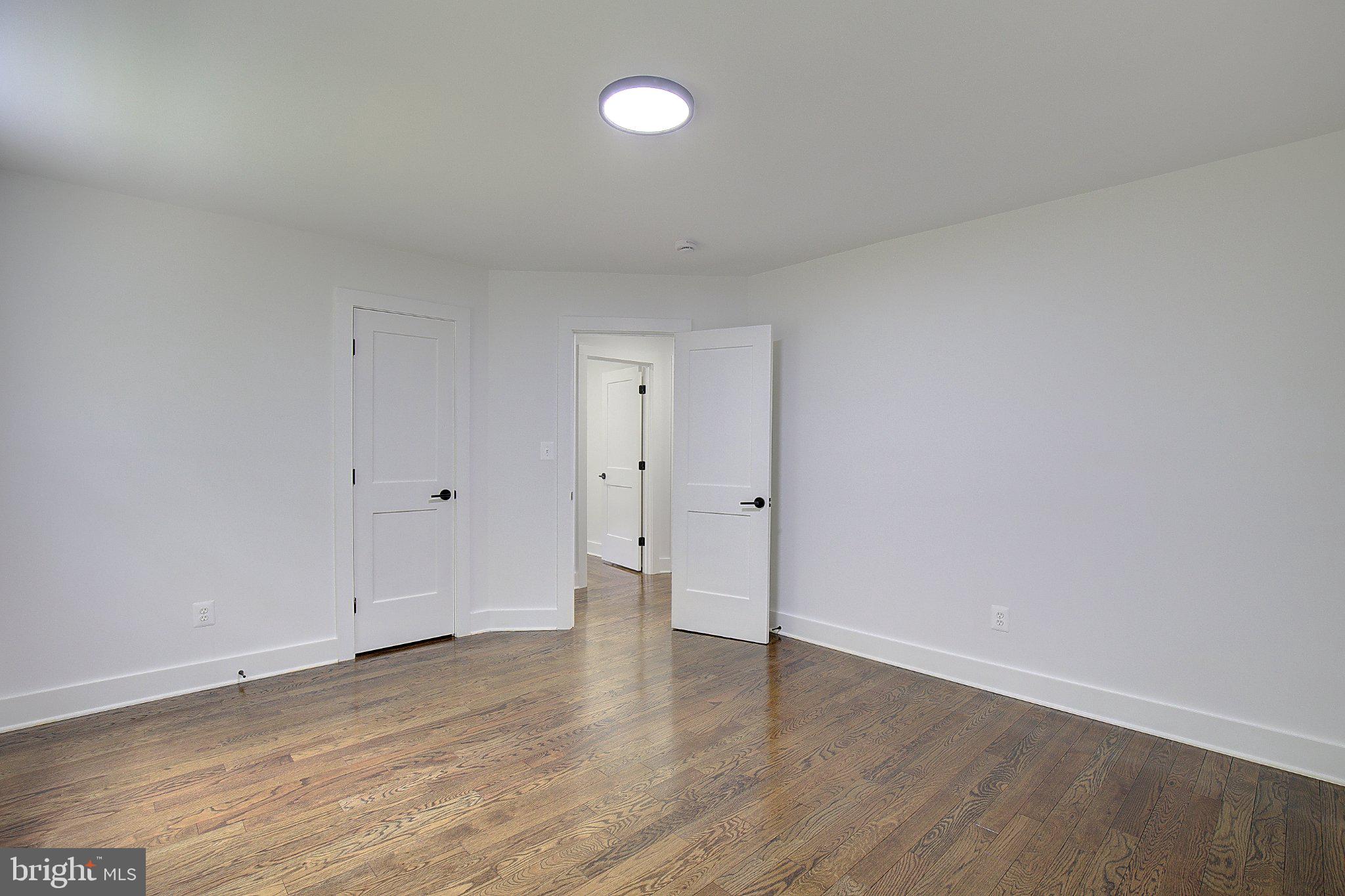 1107 Swan Creek Road Fort Washington, MD 20744 - Photo 38 of 72 Spacious bedroom with modern elegance.