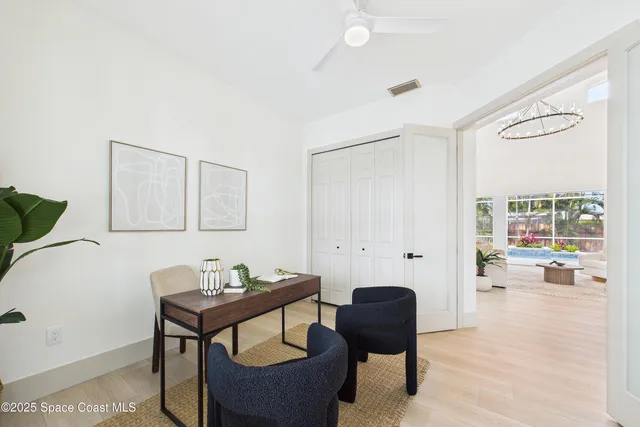 a kitchen with a stove a sink and cabinets