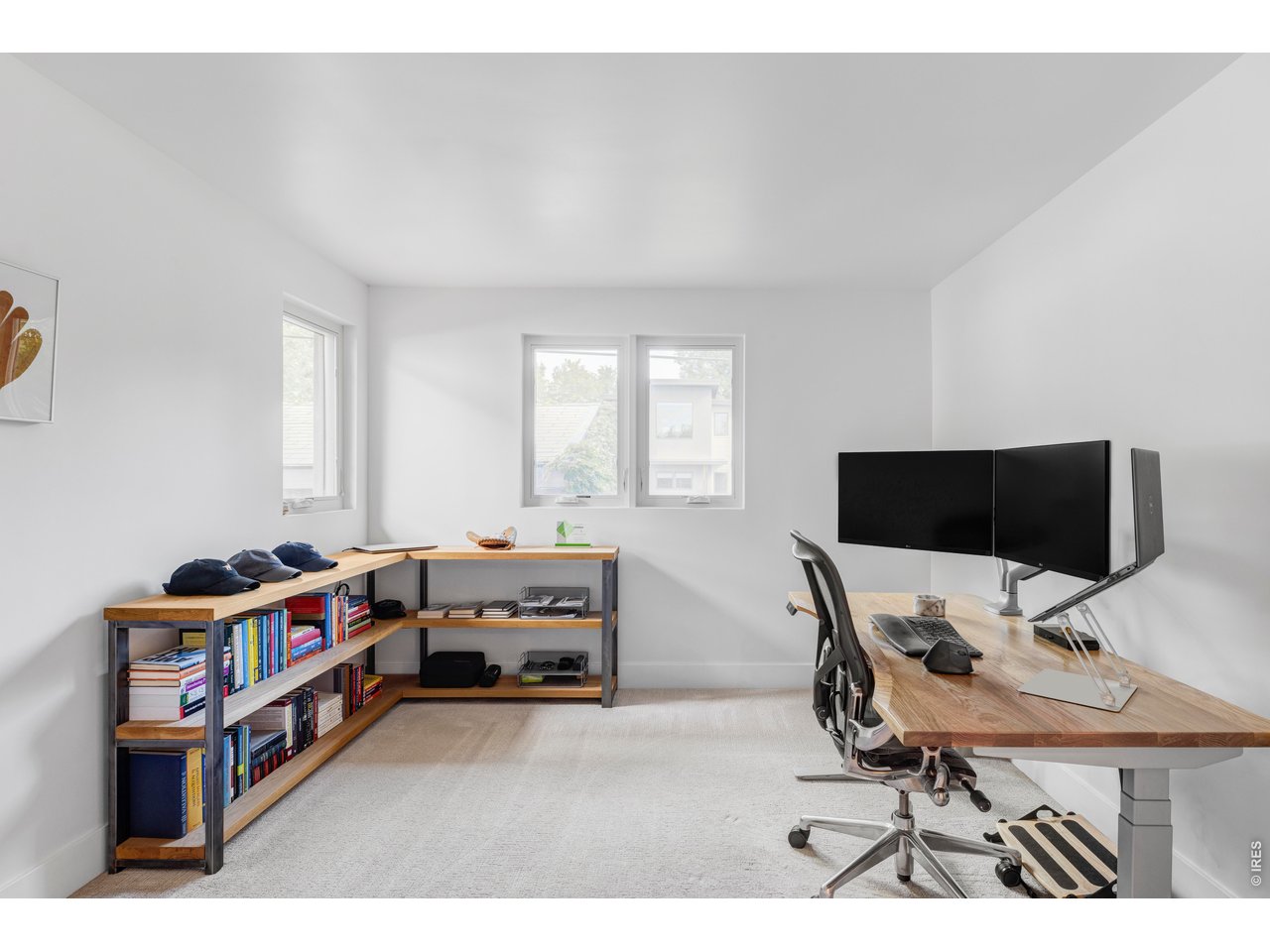 2895 18th Street Boulder, CO 80304 - Photo 22 of 29 On the main level, you'll find three bedrooms: two that share a full bathroom and the private primary suite, a tranquil retreat of its own.