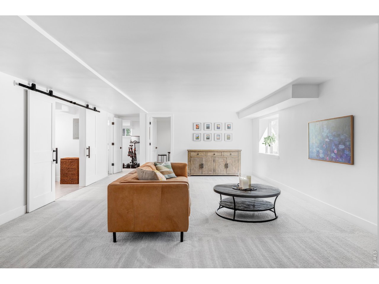 2895 18th Street Boulder, CO 80304 - Photo 24 of 29 Continue to the lower level to discover a spacious family room, a dedicated office, bathroom, and a fourth bedroom with oversized egress windows.