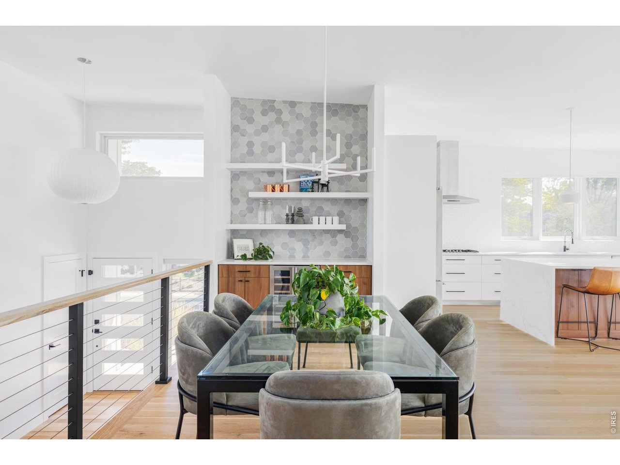 2895 18th Street Boulder, CO 80304 - Photo 8 of 29 In the dining room, a built-in buffet with a wine fridge, cabinetry, and shelving makes entertaining effortless.