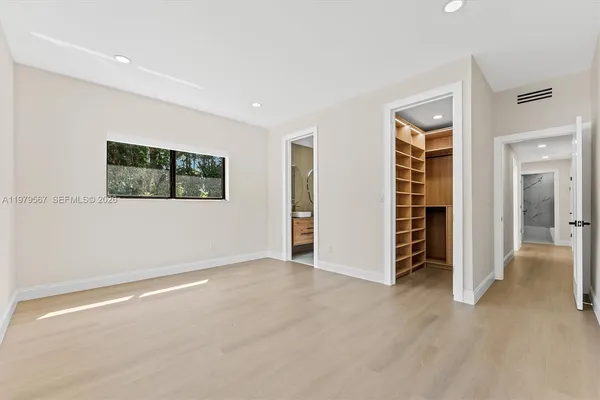 an empty room with closet