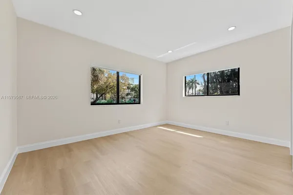 an empty room with windows