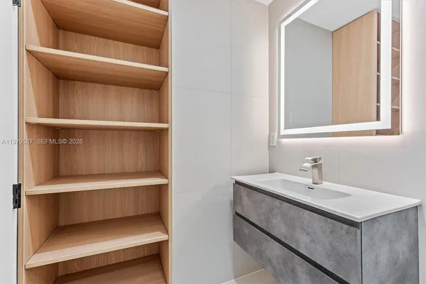 a bathroom with a sink and a toilet