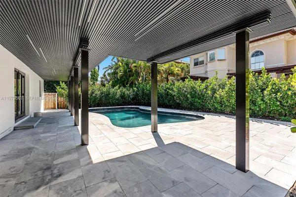 a view of a porch with wooden floor
