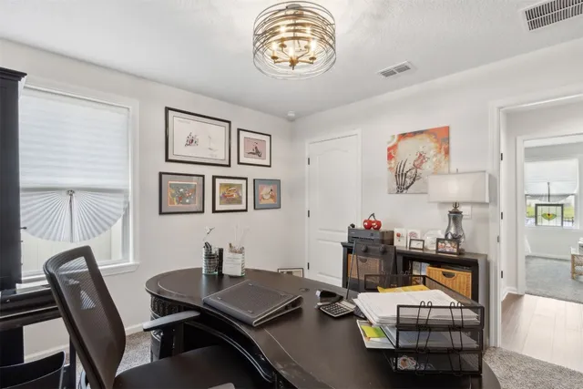 a close view of a stove top oven and cabinets